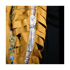 slashed leather breeches painted with caryatids and olive branches