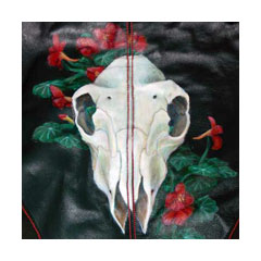 leather painted with a lamb's skull and nasturtiums