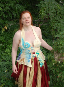 a woman wearing the Hera garments in a garden